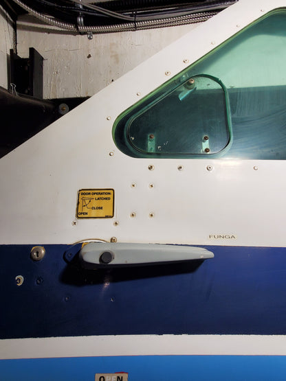 Crew Door - LH - Cessna - 5H-NWA